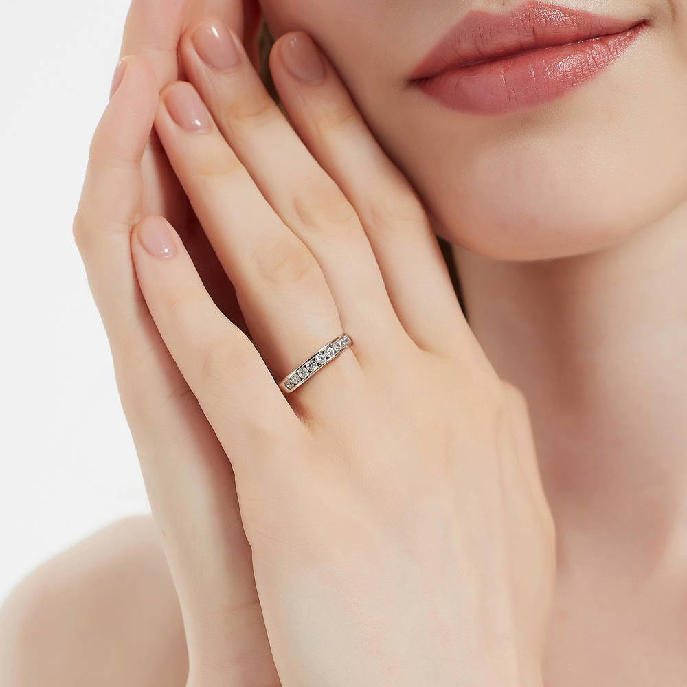 Model wearing Channel Set CZ Curved Half Eternity Ring in Sterling Silver, 6 of 9