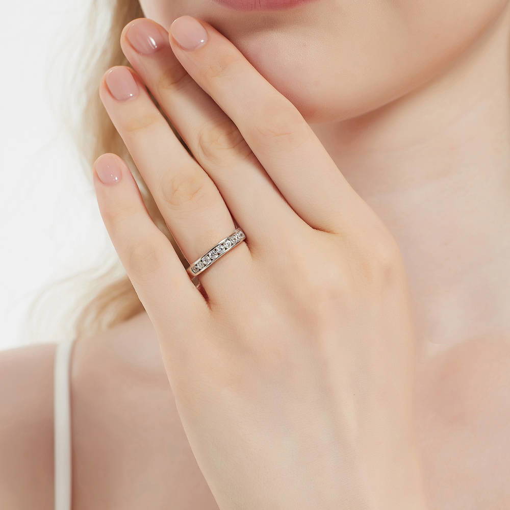 Model wearing Channel Set CZ Curved Half Eternity Ring in Sterling Silver, 3 of 9