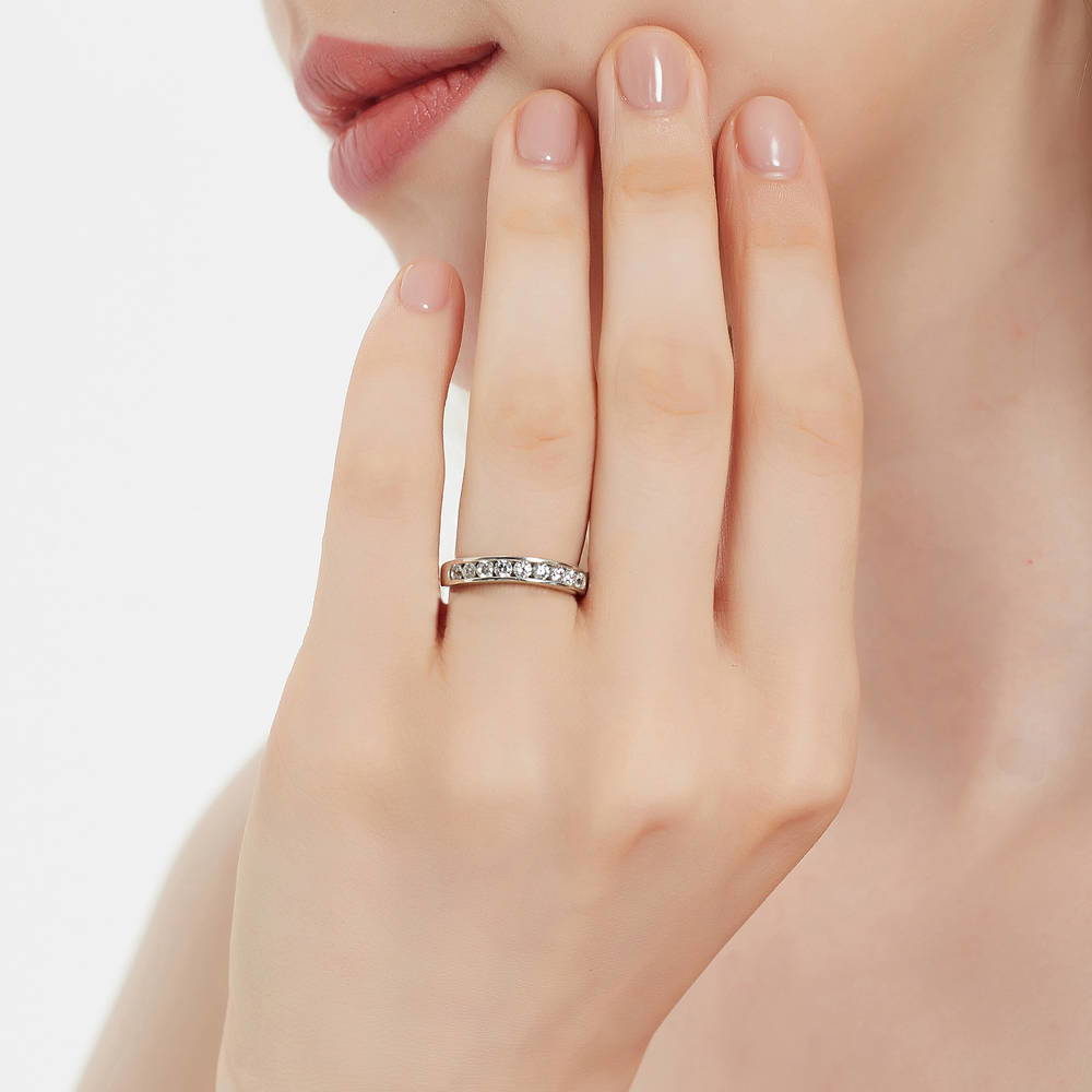 Model wearing Channel Set CZ Curved Half Eternity Ring in Sterling Silver