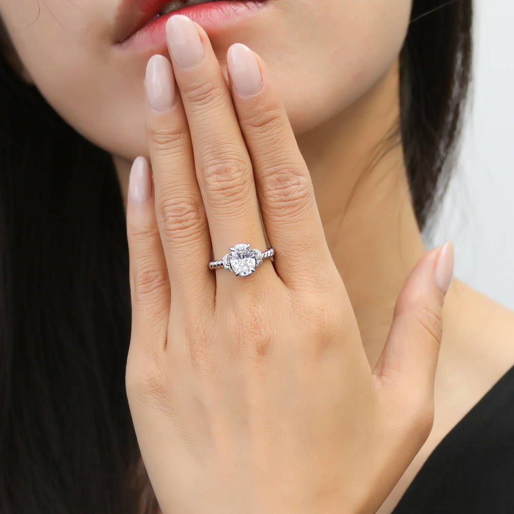 Model wearing Woven Solitaire CZ Ring in Sterling Silver