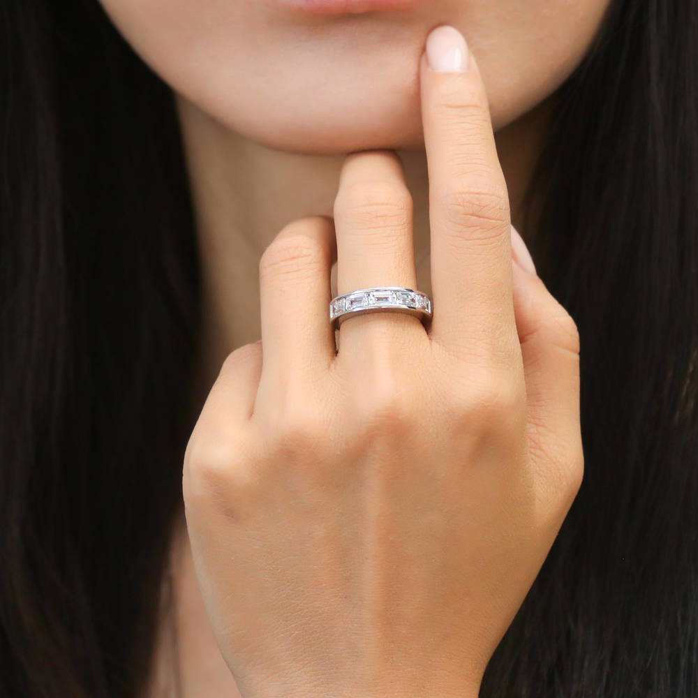 Model wearing 5-Stone Channel Emerald Cut CZ Half Eternity Ring in Sterling Silver
