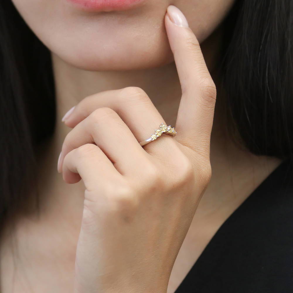 Model wearing 5-Stone Wishbone CZ Stackable Curved Band in Sterling Silver