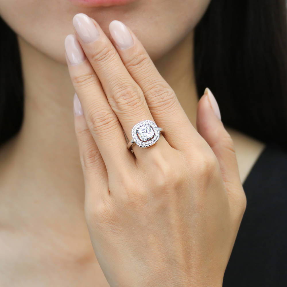 Model wearing Halo Woven Cushion CZ Ring in Sterling Silver