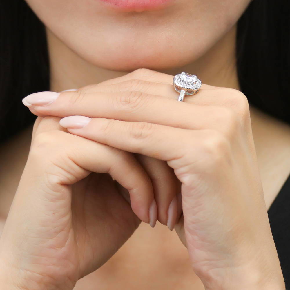 Model wearing Halo Woven Cushion CZ Ring in Sterling Silver