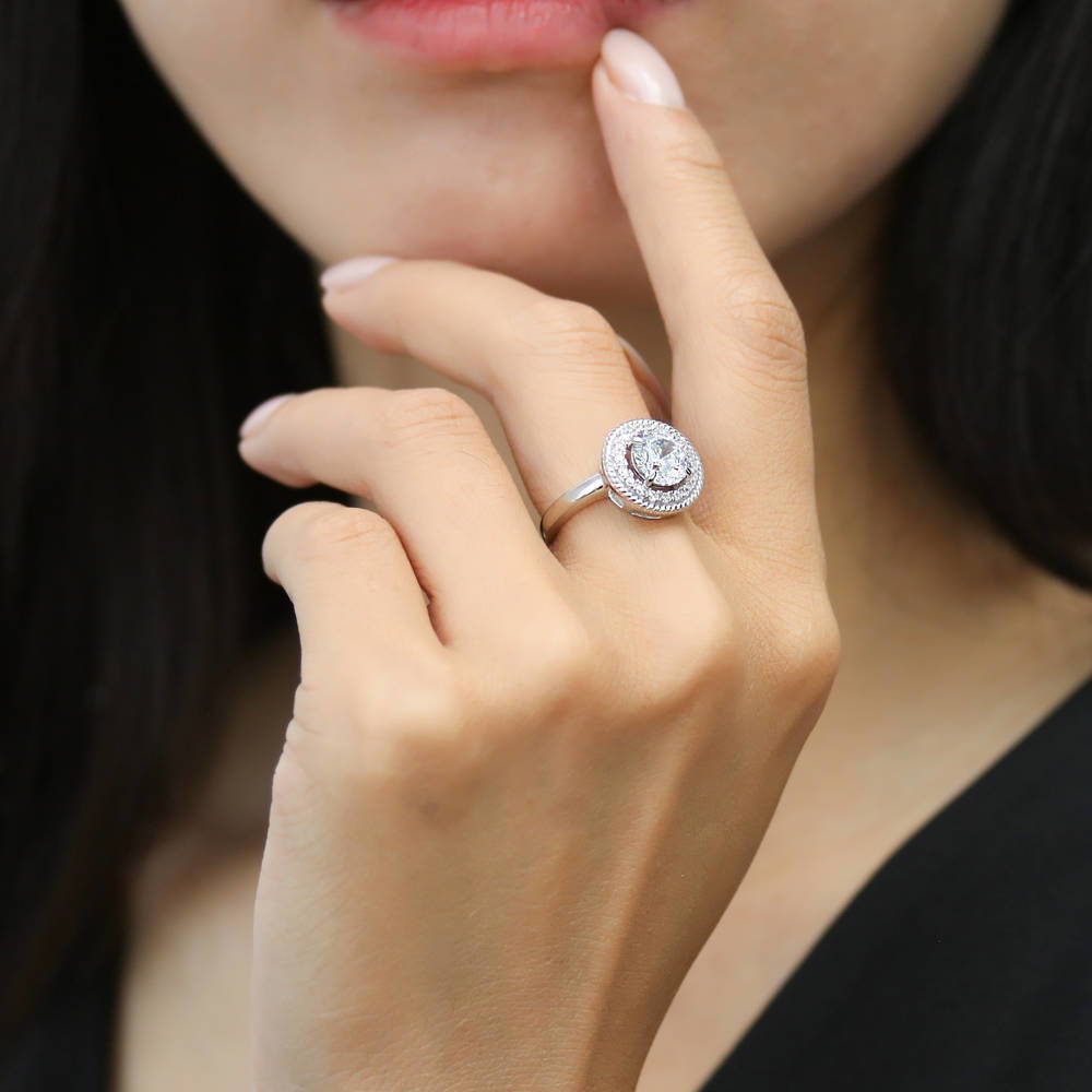 Model wearing Halo Cable Round CZ Ring in Sterling Silver