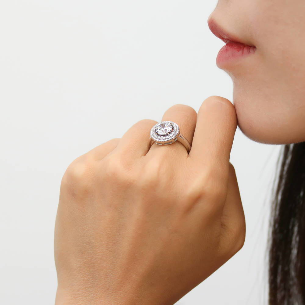 Model wearing Halo Cable Round CZ Ring in Sterling Silver