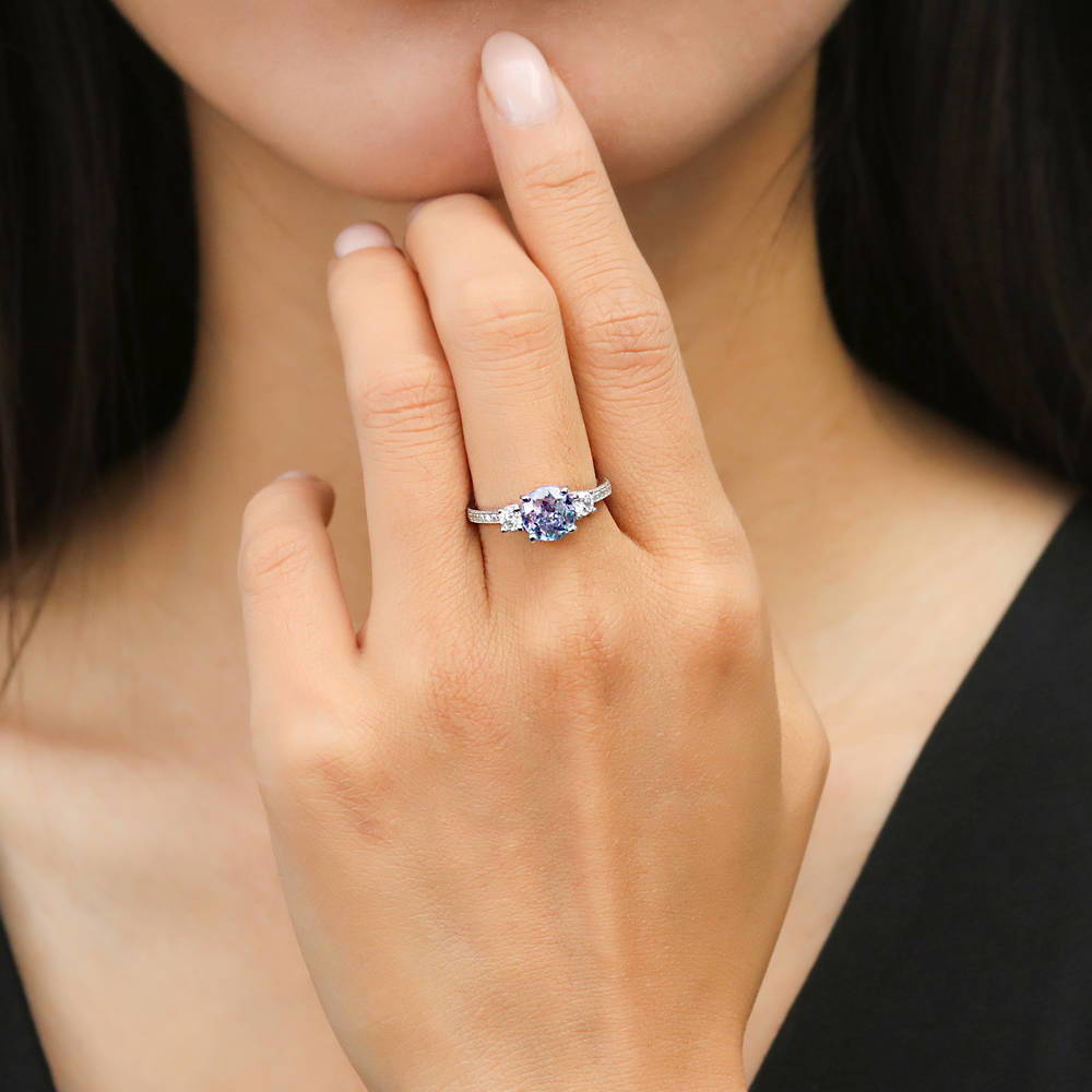 Model wearing 3-Stone Kaleidoscope Purple Aqua Round CZ Ring in Sterling Silver