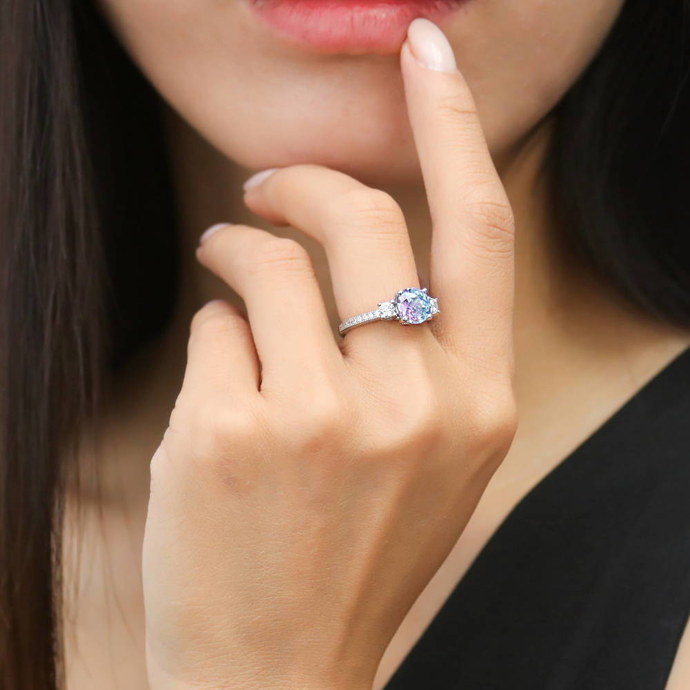 Model wearing 3-Stone Kaleidoscope Purple Aqua Round CZ Ring in Sterling Silver