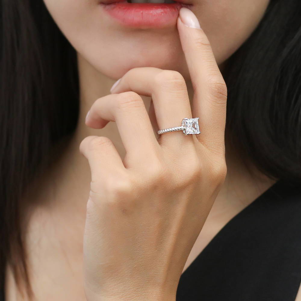 Model wearing Woven Solitaire CZ Ring in Sterling Silver