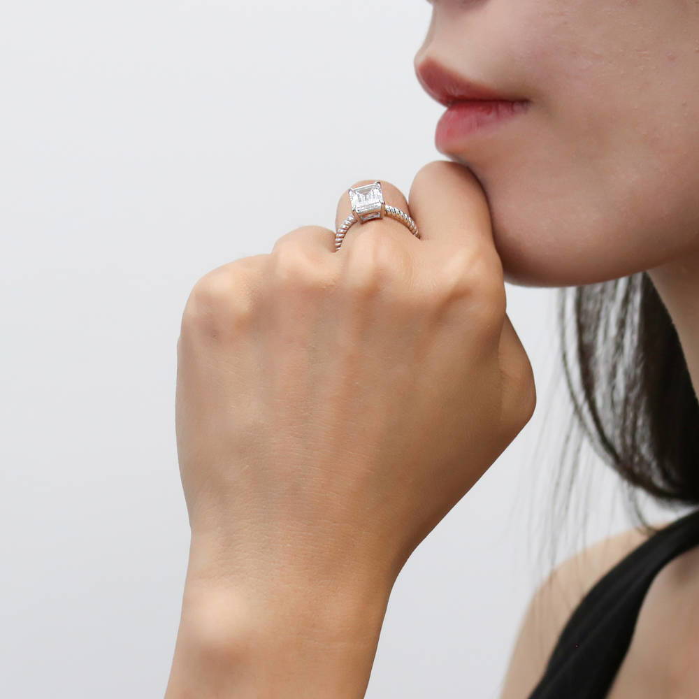Model wearing Woven Solitaire CZ Ring in Sterling Silver