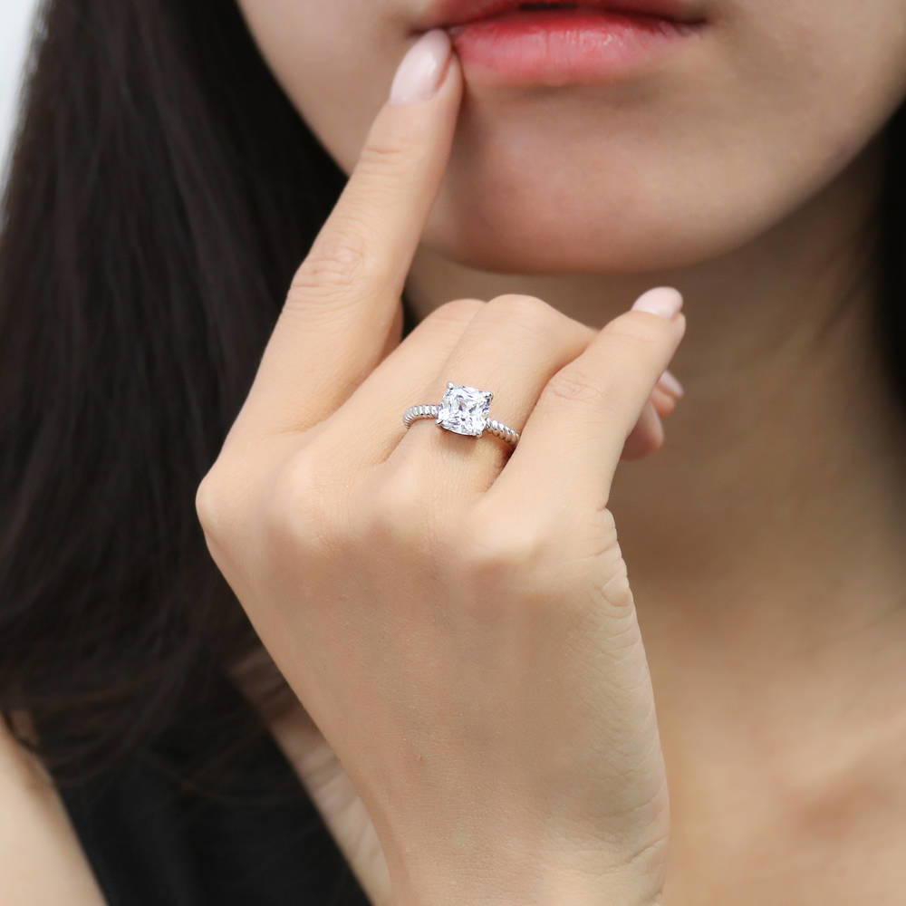 Model wearing Woven Solitaire CZ Ring in Sterling Silver