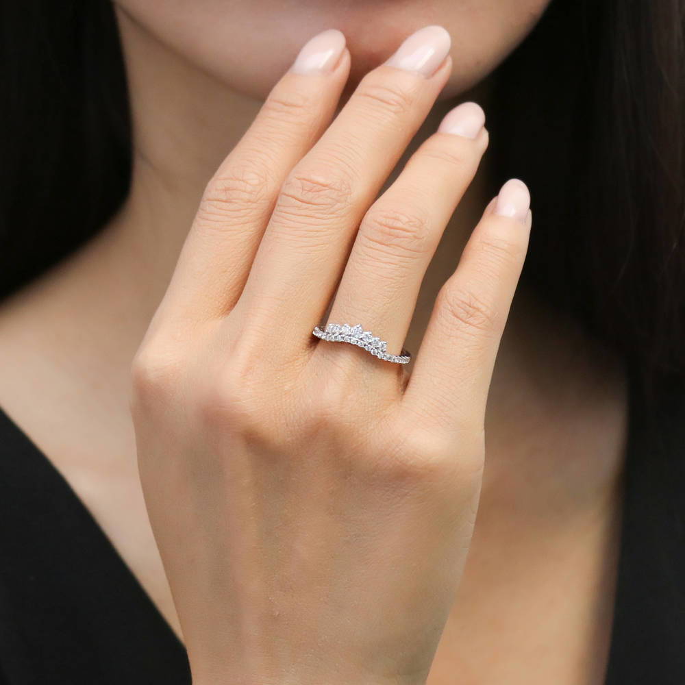 Model wearing Wishbone CZ Curved Half Eternity Ring in Sterling Silver, 2 of 9