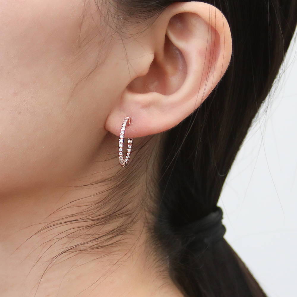 Model wearing CZ Small Inside-Out Hoop Earrings in Sterling Silver 0.8 inch, Rose Gold Flashed