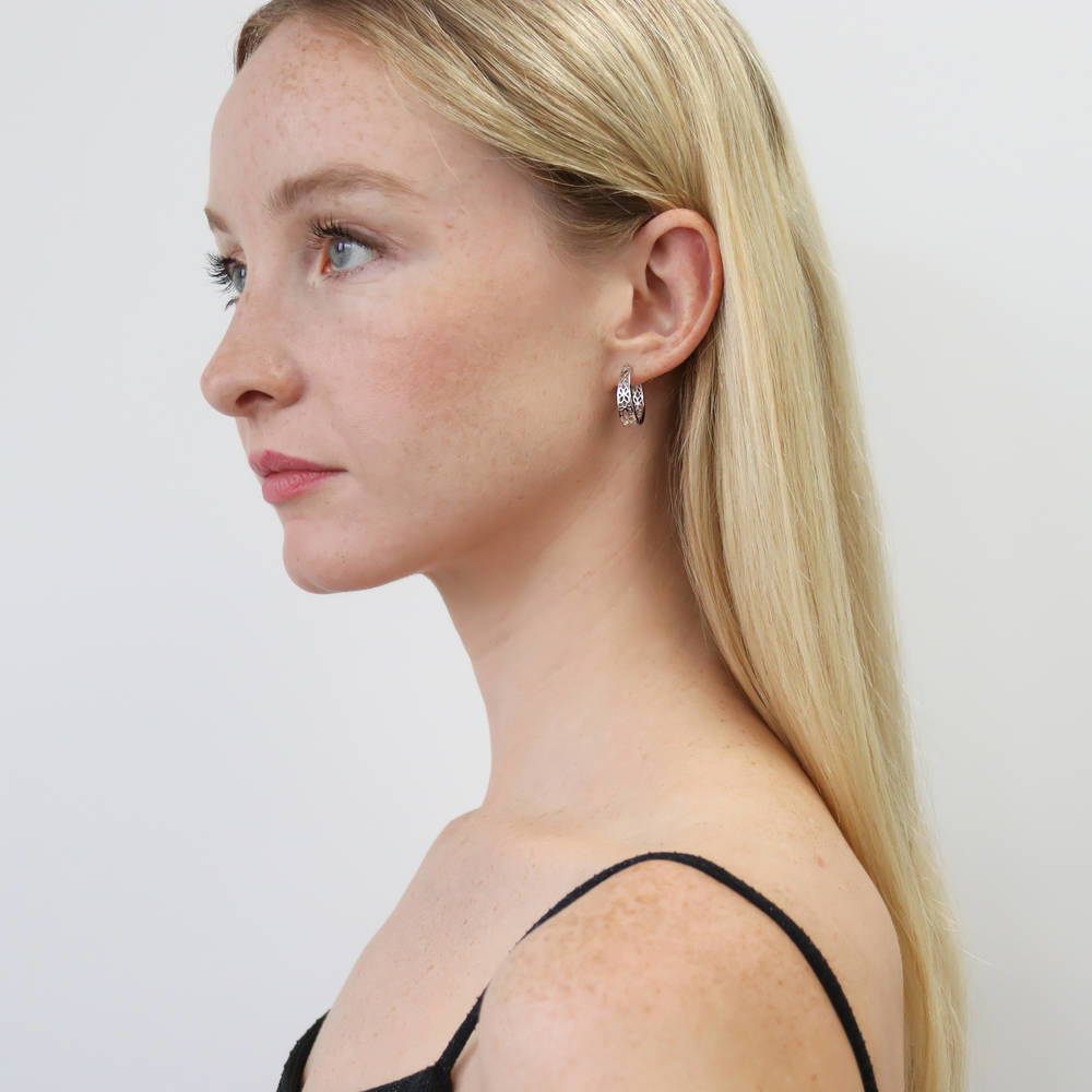Model wearing Flower Medium Hoop Earrings in Sterling Silver 0.73 inch, 2 of 5