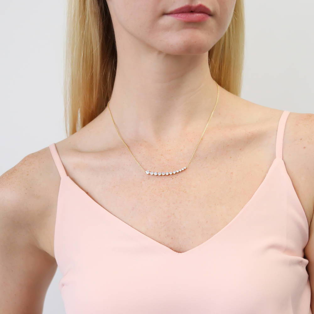 Model wearing Graduated Bar CZ Pendant Necklace in Gold Flashed Sterling Silver