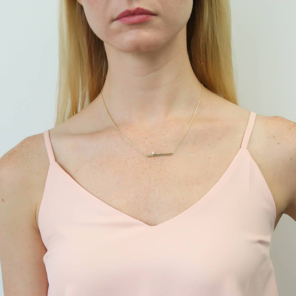 Model wearing Bar CZ Pendant Necklace in Gold Flashed Sterling Silver