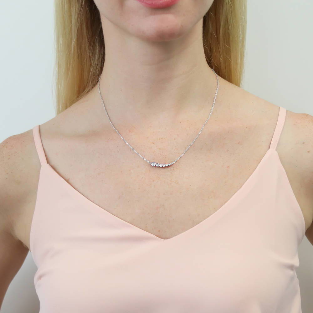 Model wearing Bubble Graduated CZ Pendant Necklace in Sterling Silver