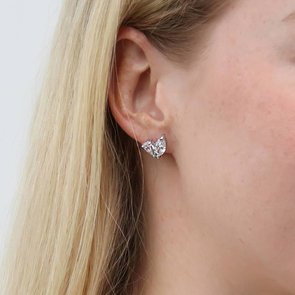 Model wearing 2-Stone CZ Stud Earrings in Sterling Silver