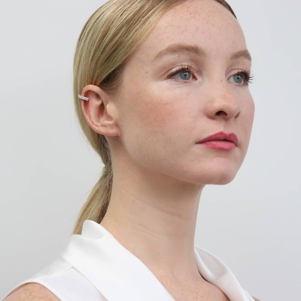 Model wearing CZ Ear Cuff Cartilage Earrings in Sterling Silver, Yellow Gold Flashed