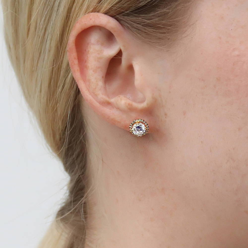 Model wearing Halo Round CZ Stud Earrings in Sterling Silver