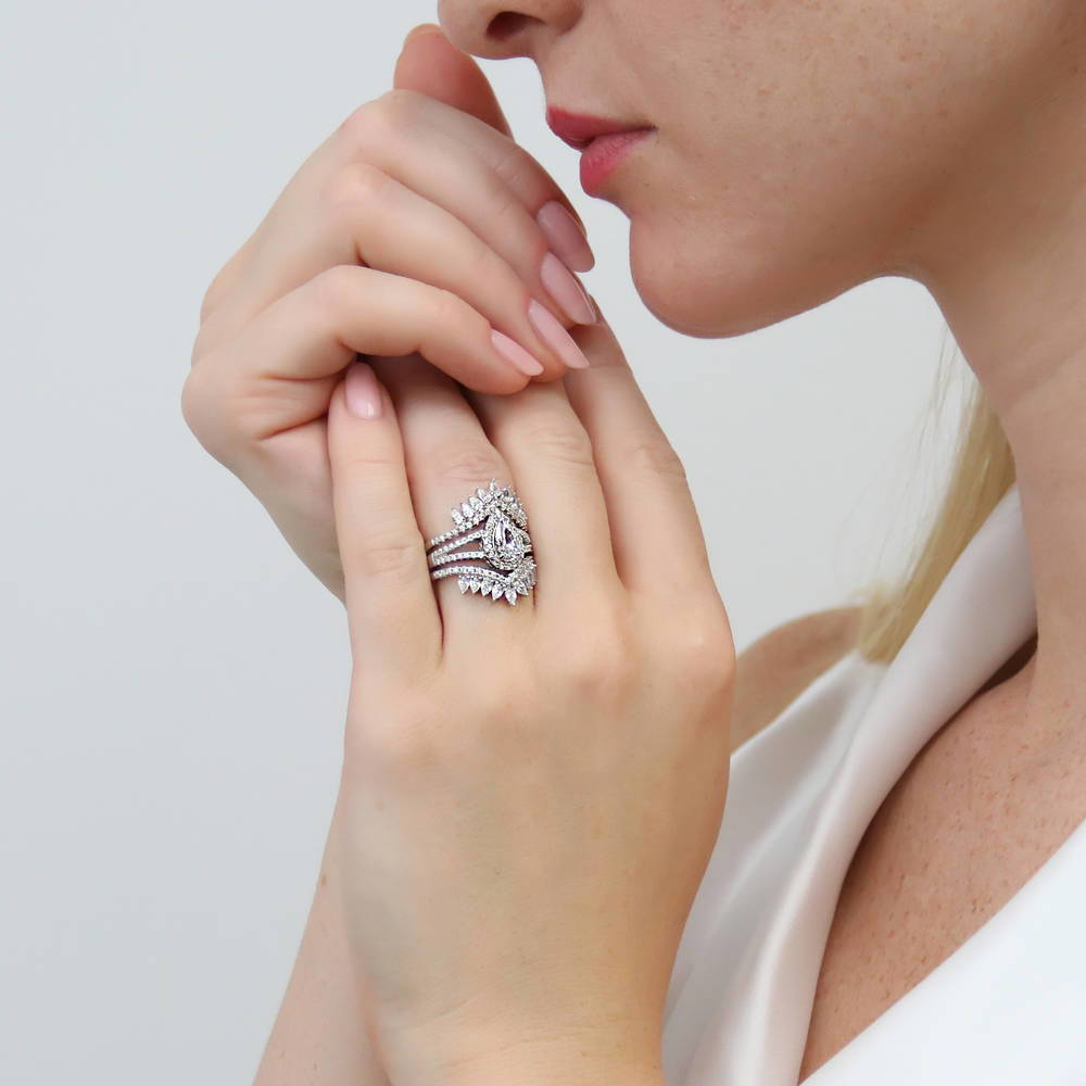 Model wearing Halo Pear CZ Split Shank Ring Set in Sterling Silver