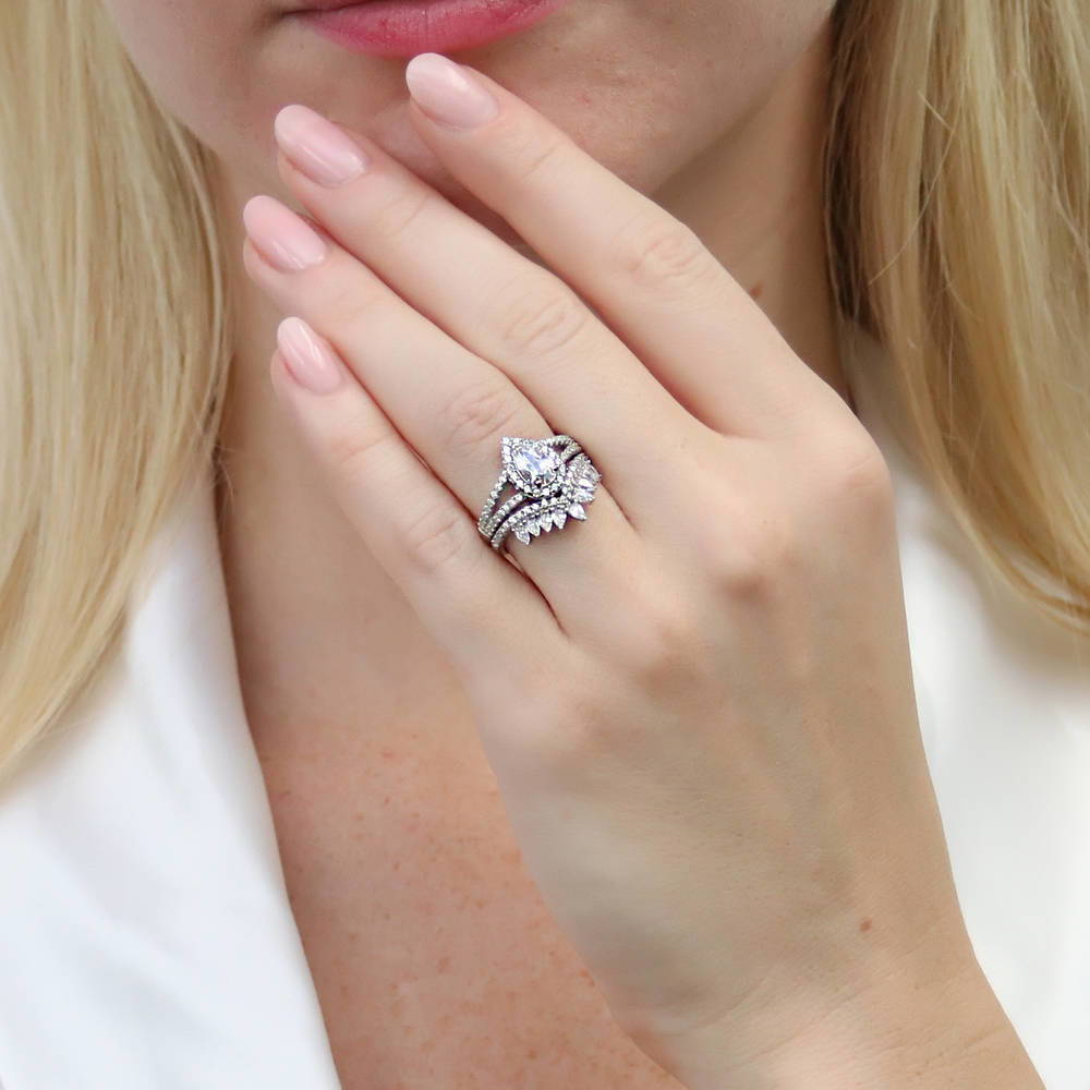 Model wearing Halo Pear CZ Split Shank Ring Set in Sterling Silver