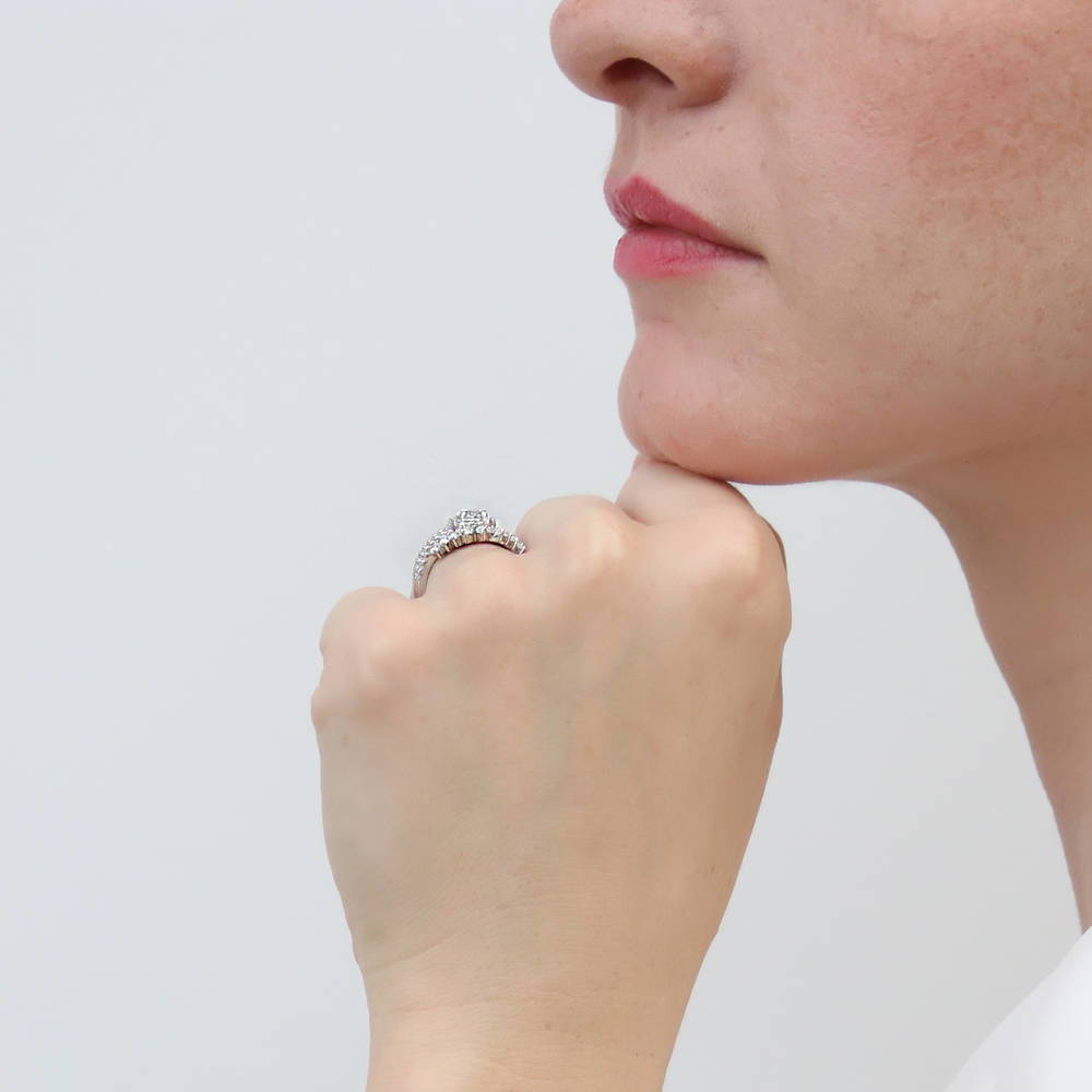 Model wearing Halo Pear CZ Split Shank Ring Set in Sterling Silver