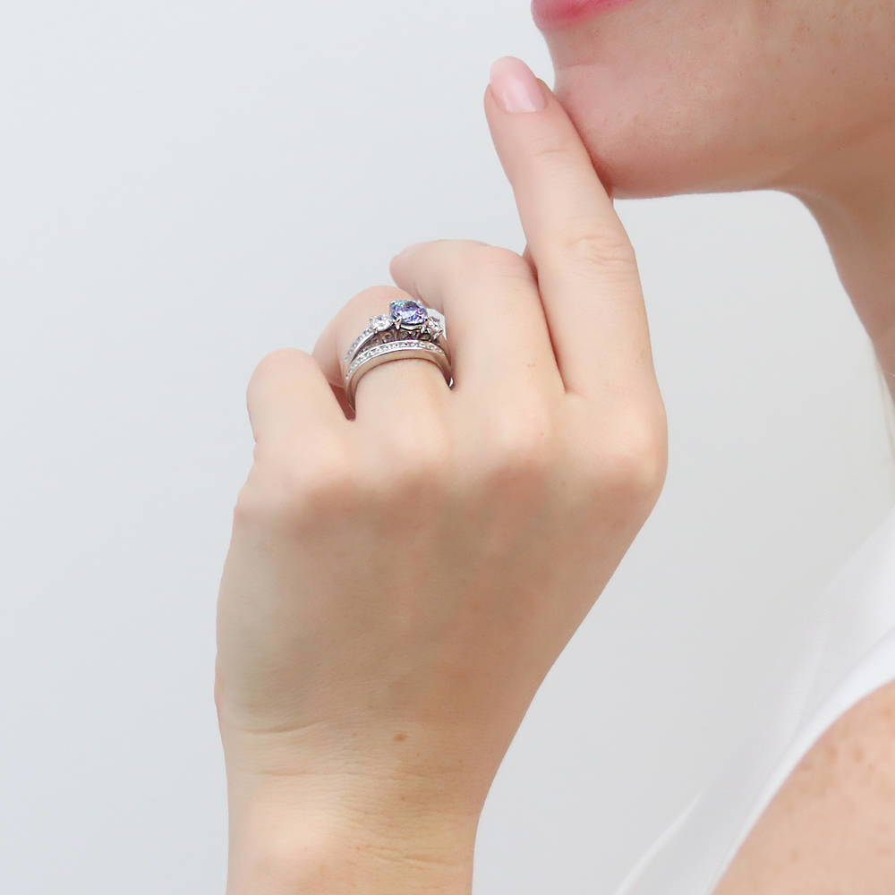 Model wearing 3-Stone Kaleidoscope Purple Aqua Round CZ Ring Set in Sterling Silver