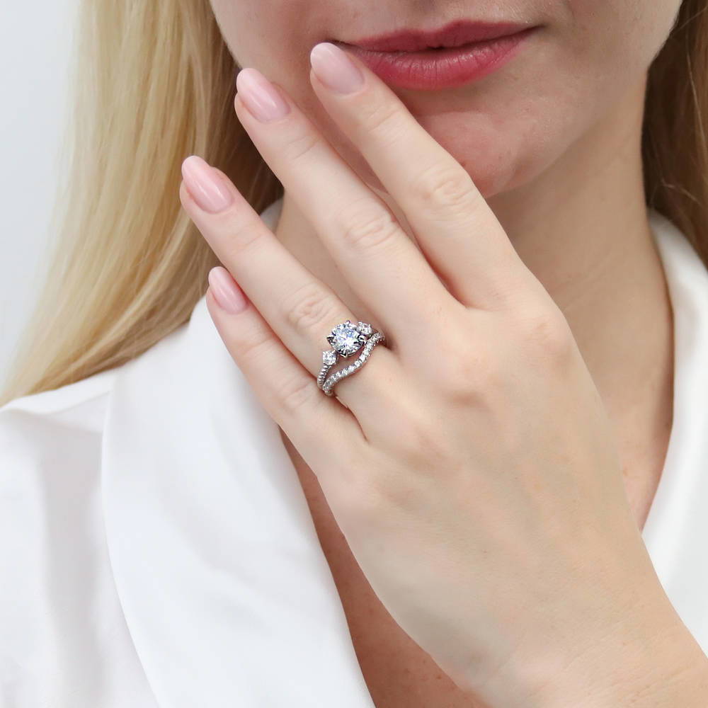 Model wearing 3-Stone Woven Round CZ Ring Set in Sterling Silver