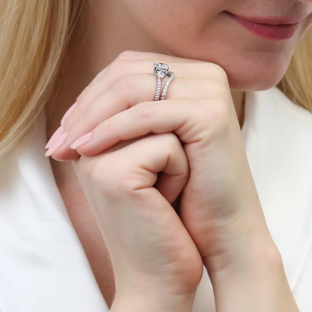 Model wearing 3-Stone Woven Round CZ Ring Set in Sterling Silver