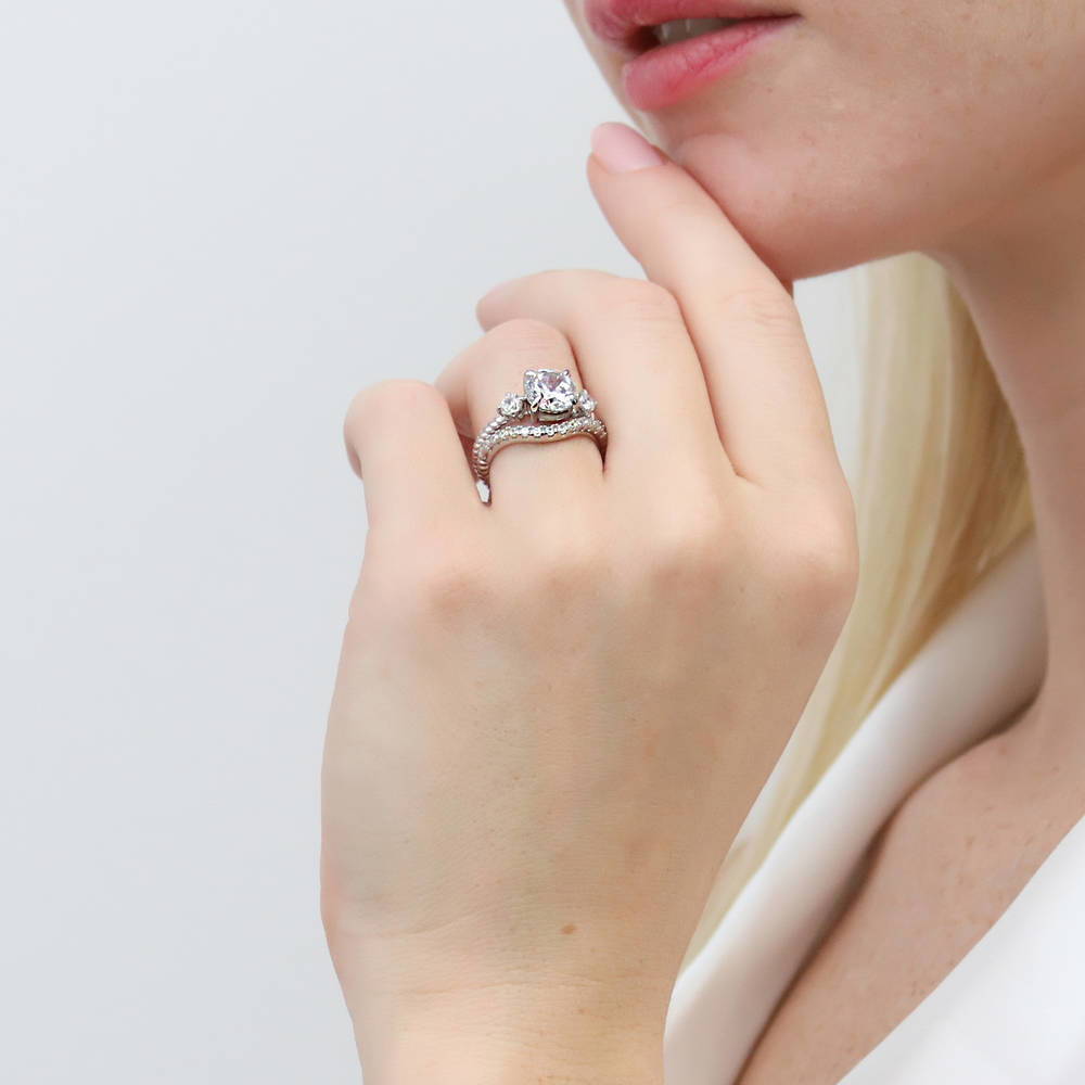 Model wearing 3-Stone Woven Round CZ Ring Set in Sterling Silver