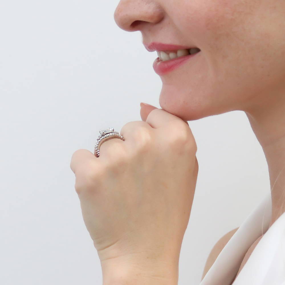 Model wearing 3-Stone Woven Emerald Cut CZ Ring Set in Sterling Silver