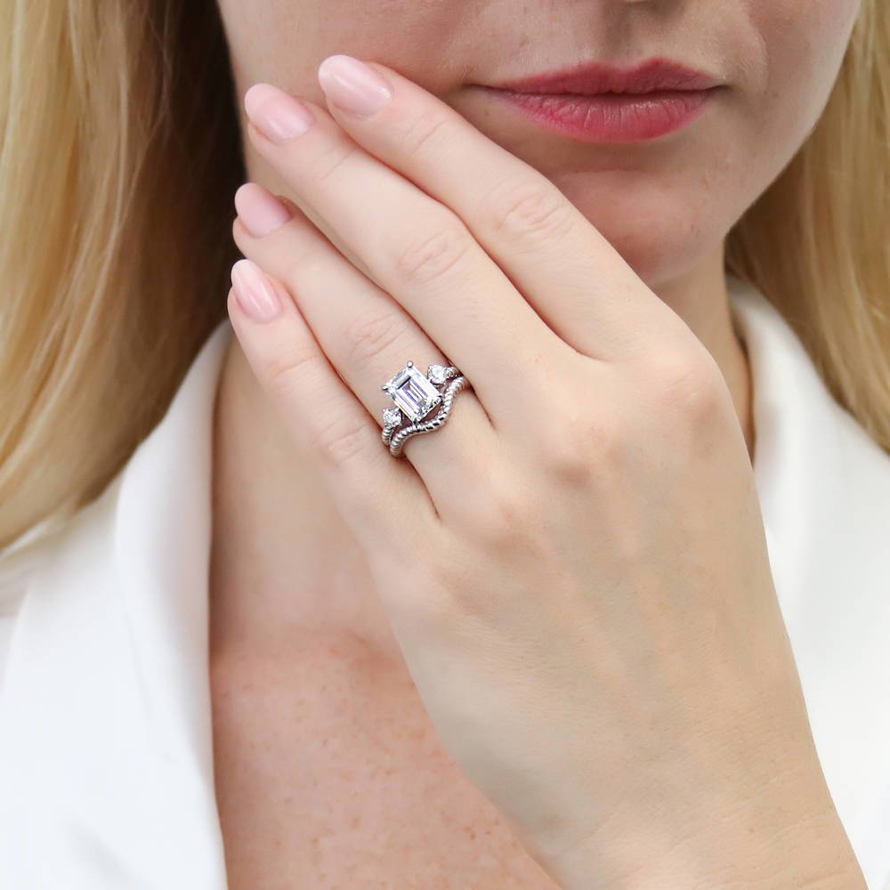 Model wearing 3-Stone Chevron Emerald Cut CZ Ring Set in Sterling Silver