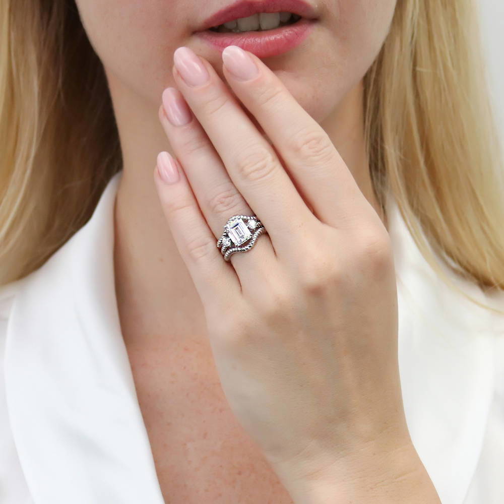 Model wearing 3-Stone Chevron Emerald Cut CZ Ring Set in Sterling Silver