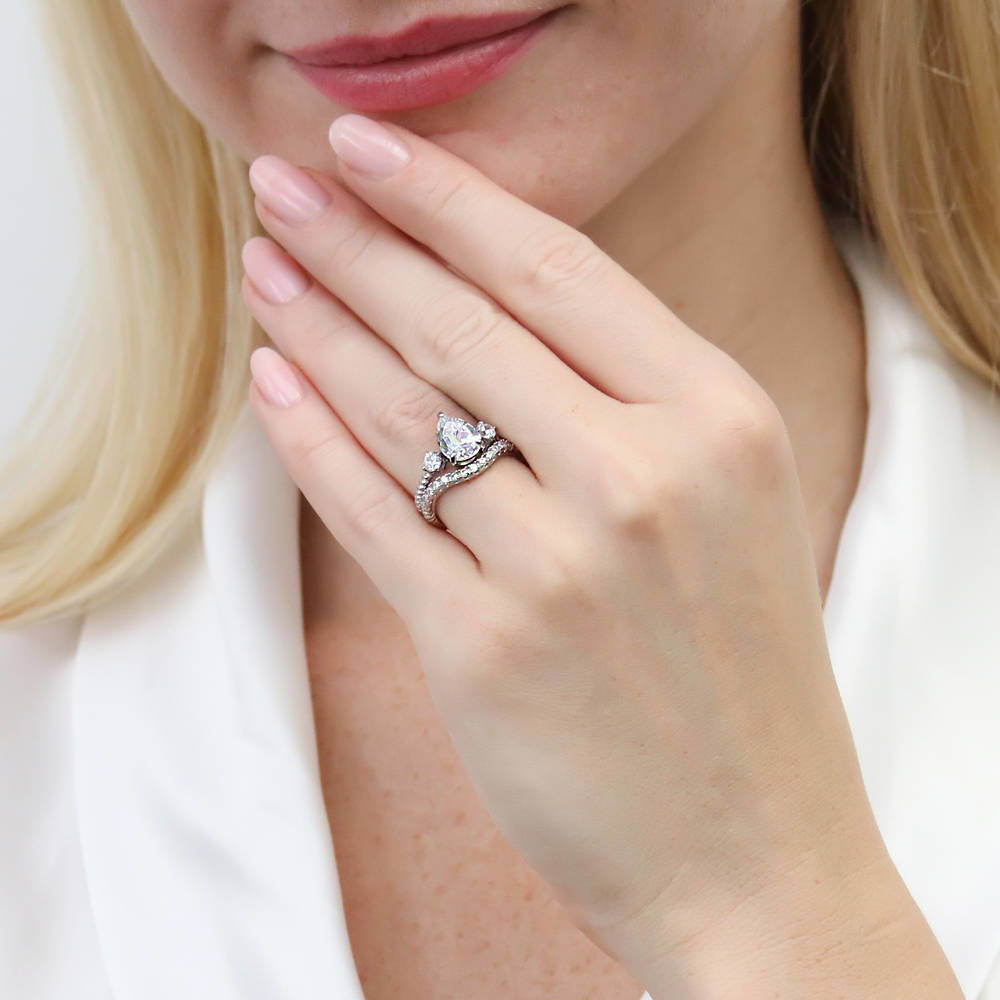 Model wearing 3-Stone Woven Pear CZ Ring Set in Sterling Silver