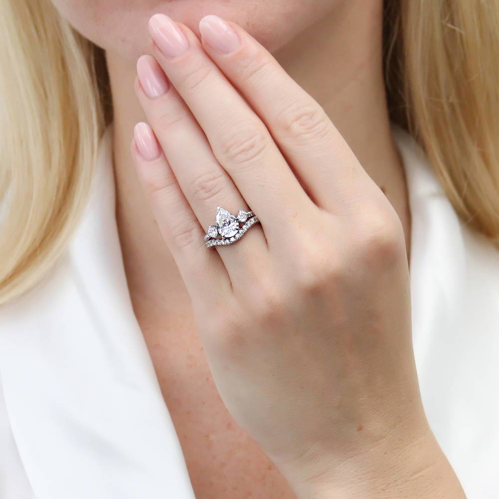 Model wearing 3-Stone Woven Pear CZ Ring Set in Sterling Silver