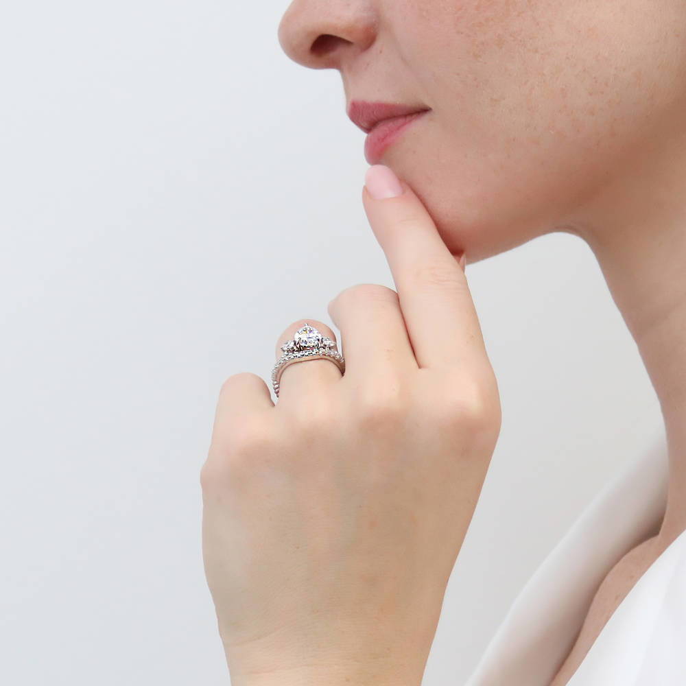 Model wearing 3-Stone Woven Pear CZ Ring Set in Sterling Silver