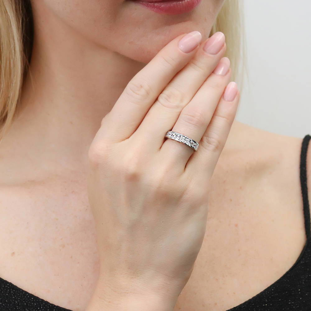 Model wearing Channel Set Cushion CZ Half Eternity Ring in Sterling Silver, 3 of 9