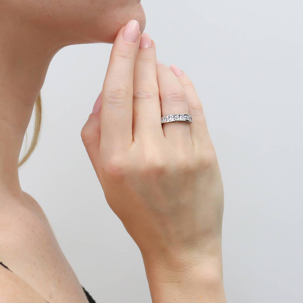 Model wearing Channel Set Cushion CZ Half Eternity Ring in Sterling Silver, 2 of 9