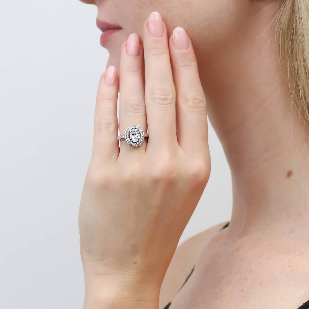 Model wearing Halo Woven Oval CZ Ring in Sterling Silver