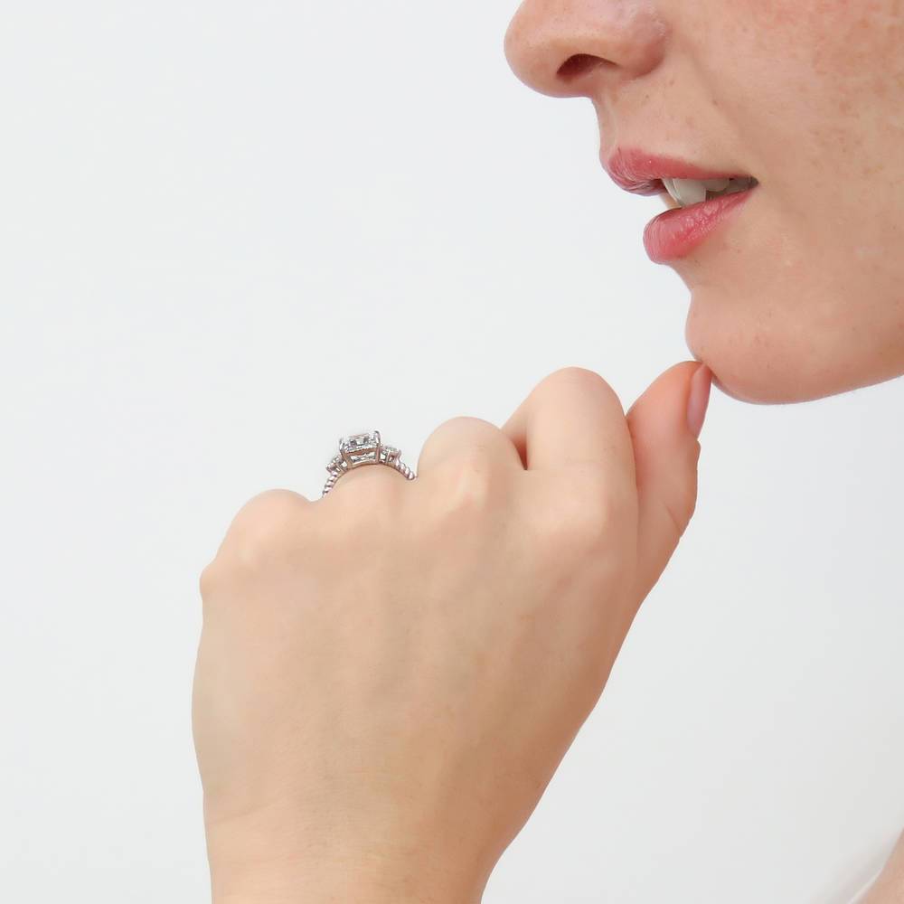 Model wearing 3-Stone Woven Princess CZ Ring in Sterling Silver