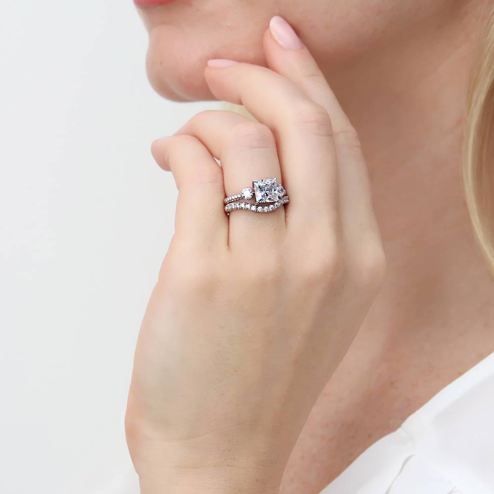 Model wearing 3-Stone Woven Princess CZ Ring Set in Sterling Silver