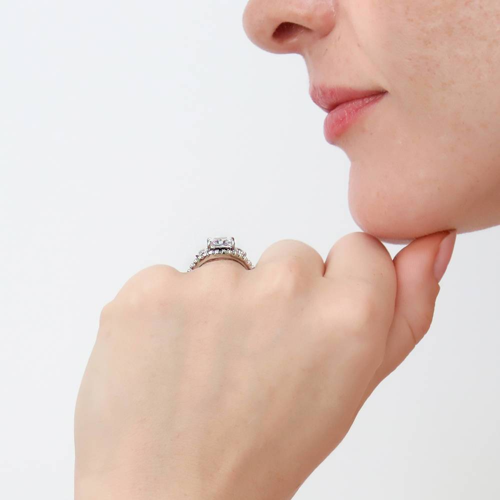 Model wearing 3-Stone Woven Princess CZ Ring Set in Sterling Silver