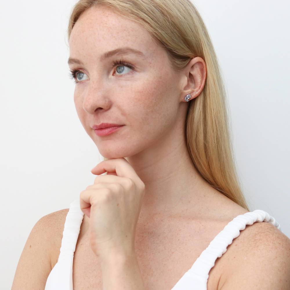 Model wearing 2-Stone CZ Stud Earrings in Sterling Silver