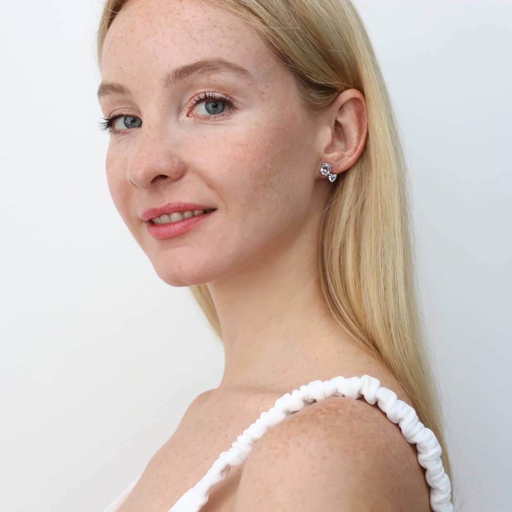 Model wearing 2-Stone CZ Stud Earrings in Sterling Silver