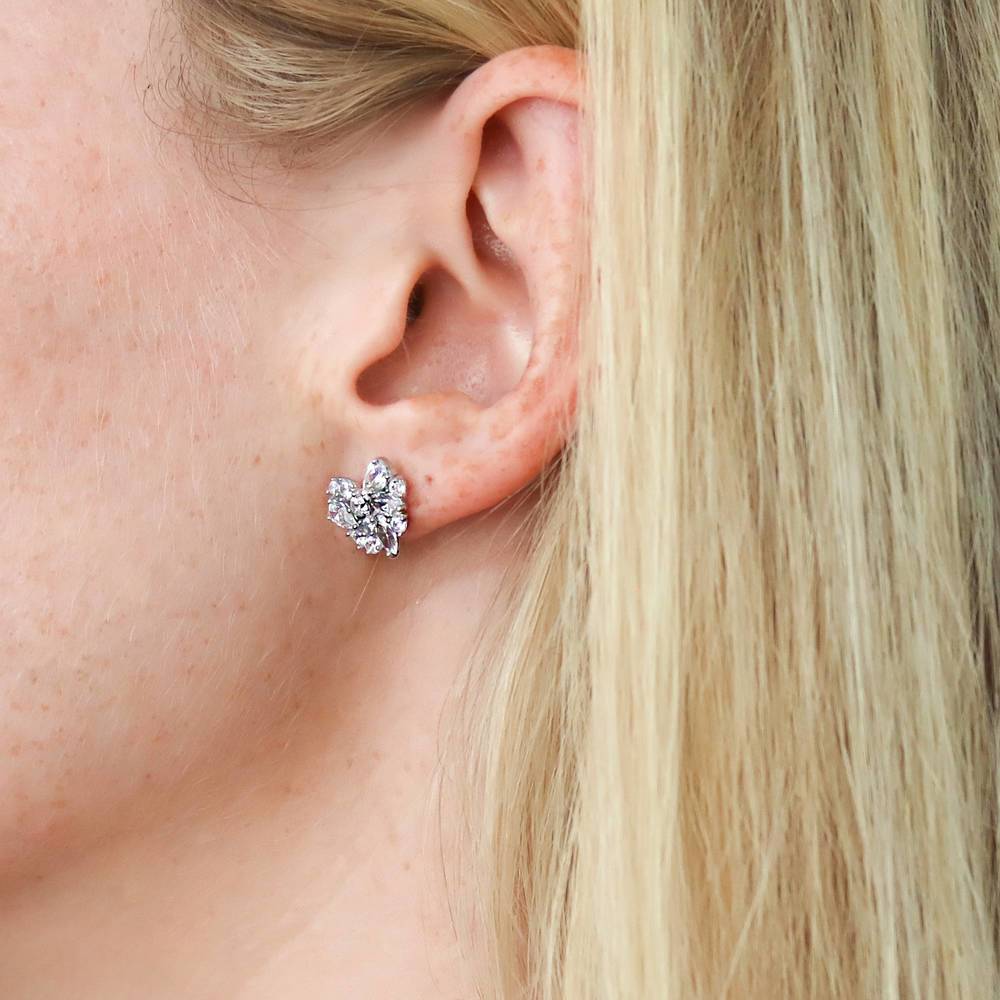 Model wearing Cluster Heart CZ Stud Earrings in Sterling Silver