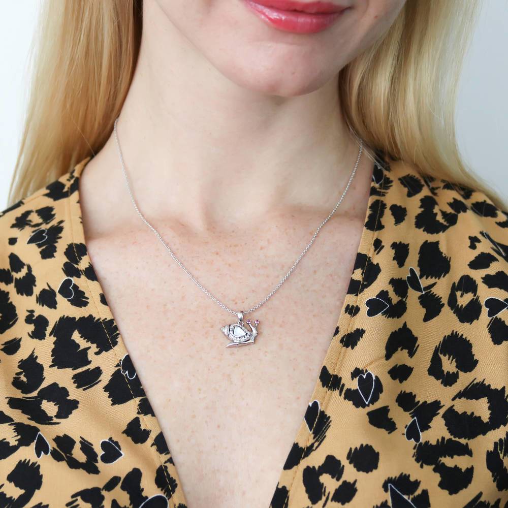 Model wearing Snail Mother Of Pearl Pendant Necklace in Sterling Silver