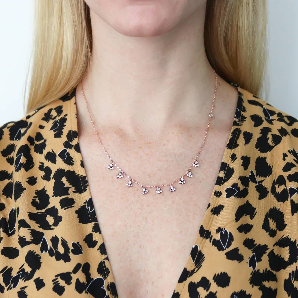 Model wearing Cluster CZ Station Necklace in Rose Gold Flashed Sterling Silver