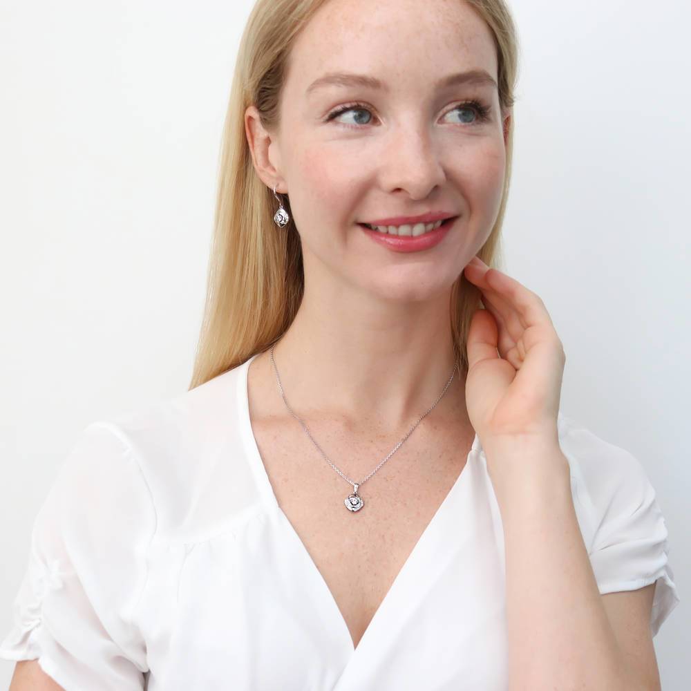 Model wearing Woven CZ Necklace and Earrings Set in Sterling Silver