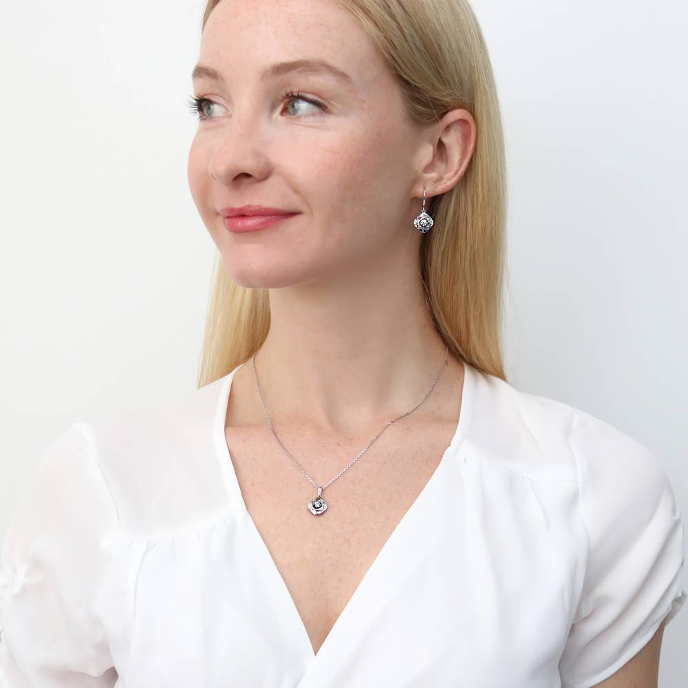 Model wearing Woven CZ Necklace and Earrings Set in Sterling Silver
